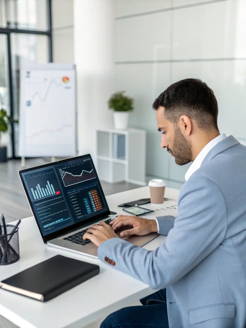 An AI specialist working on a machine learning model, demonstrating Medi Solutions LLC's proficiency in developing AI-driven solutions.